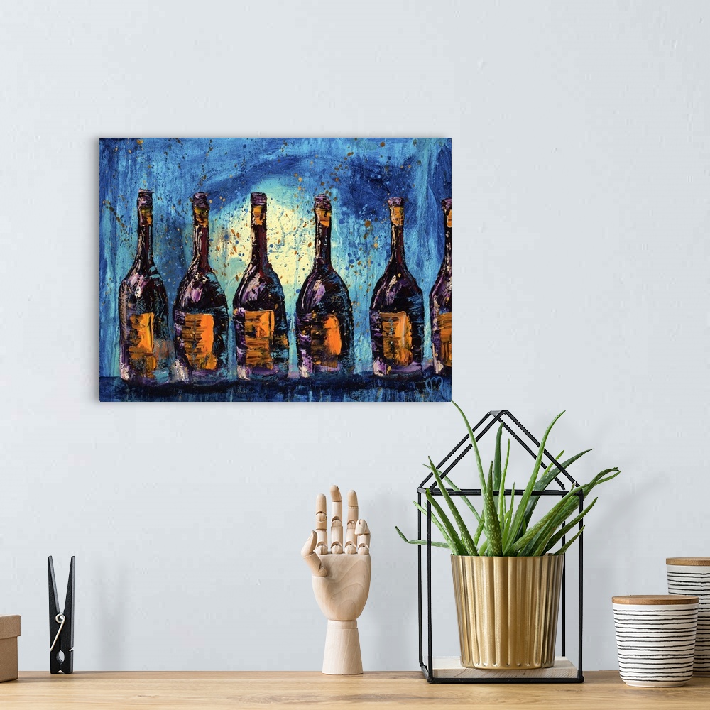 A bohemian room featuring A row of six wine bottles with yellow labels on a blue background with a paint splatter overlay.