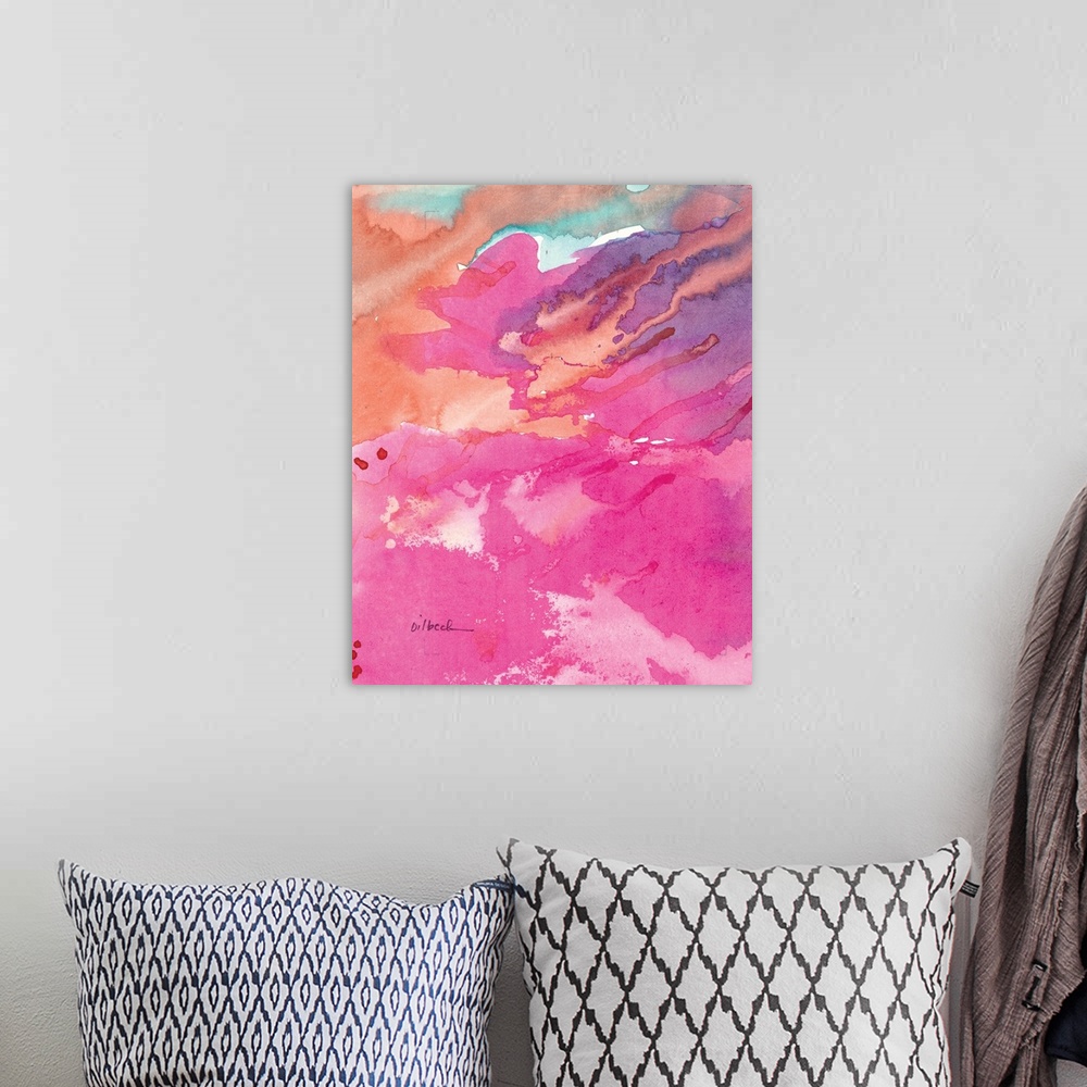 A bohemian room featuring Abstract watercolor painting with layers of pink, purple, orange, and blue hues.