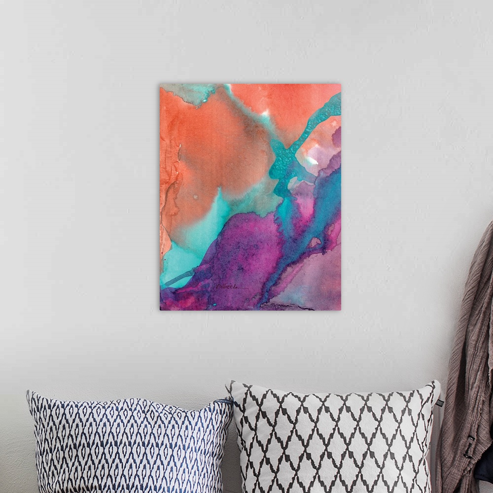 A bohemian room featuring Abstract watercolor painting with layers of pink, purple, orange, and blue hues.
