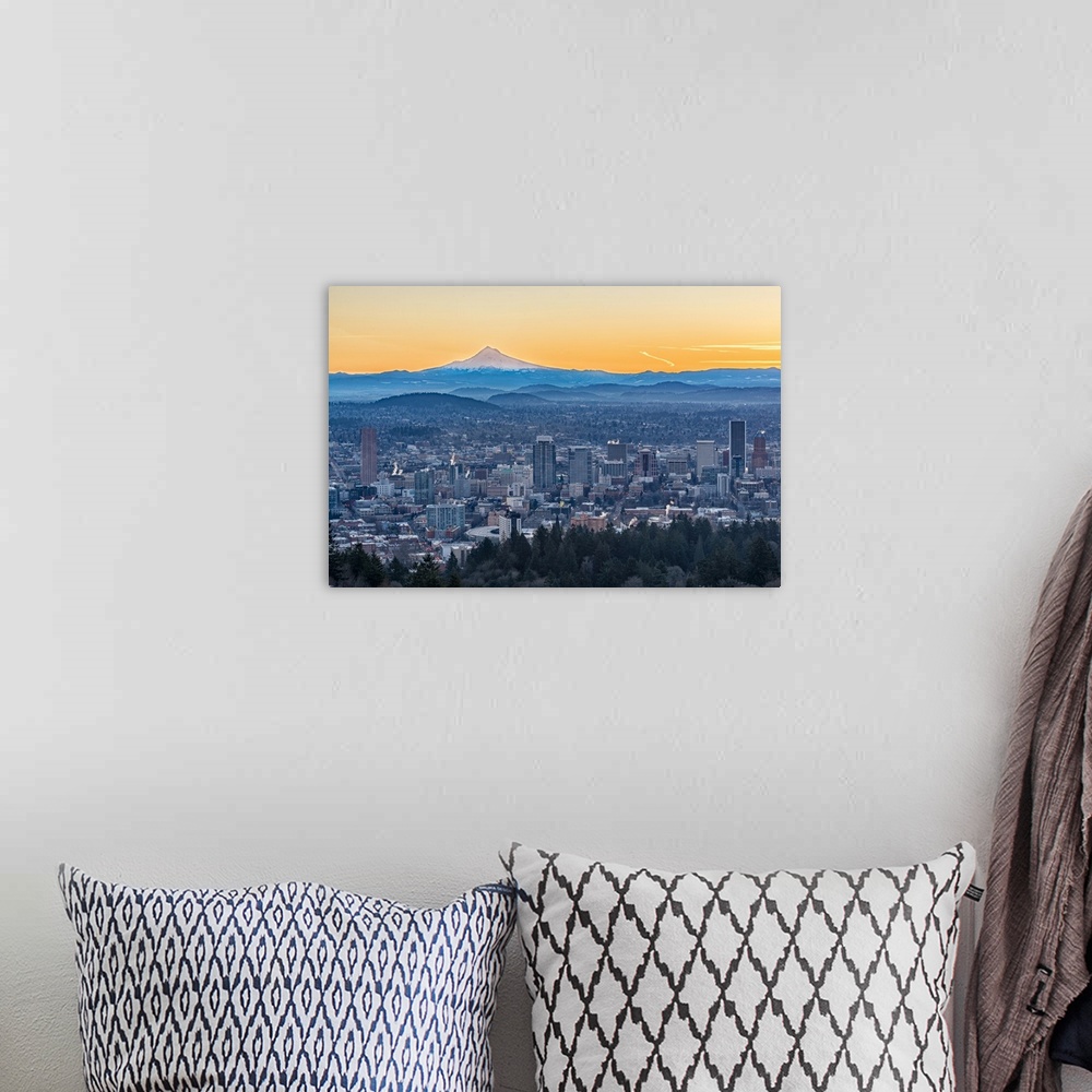 A bohemian room featuring Photograph of the city of Portland with rolling hills and Mt. Hood in the background, and an oran...
