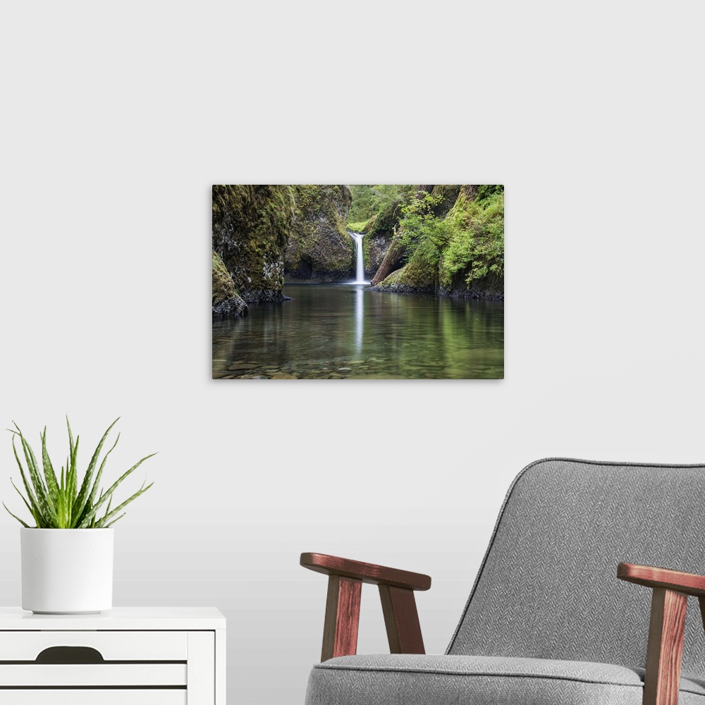 A modern room featuring Landscape photograph of Punchbowl Falls on the Columbia River in Oregon.