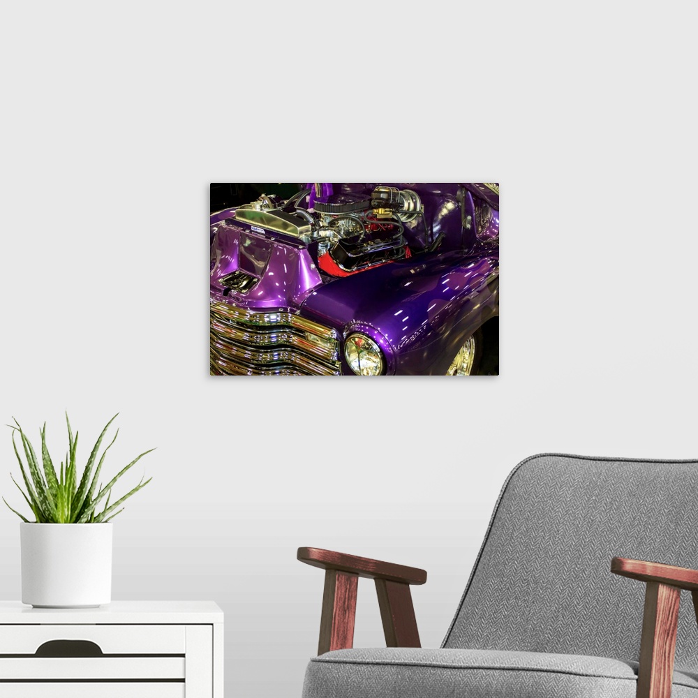 A modern room featuring Fine art photograph of a vintage car. The engine is visible and the paint job is a stunning purple.