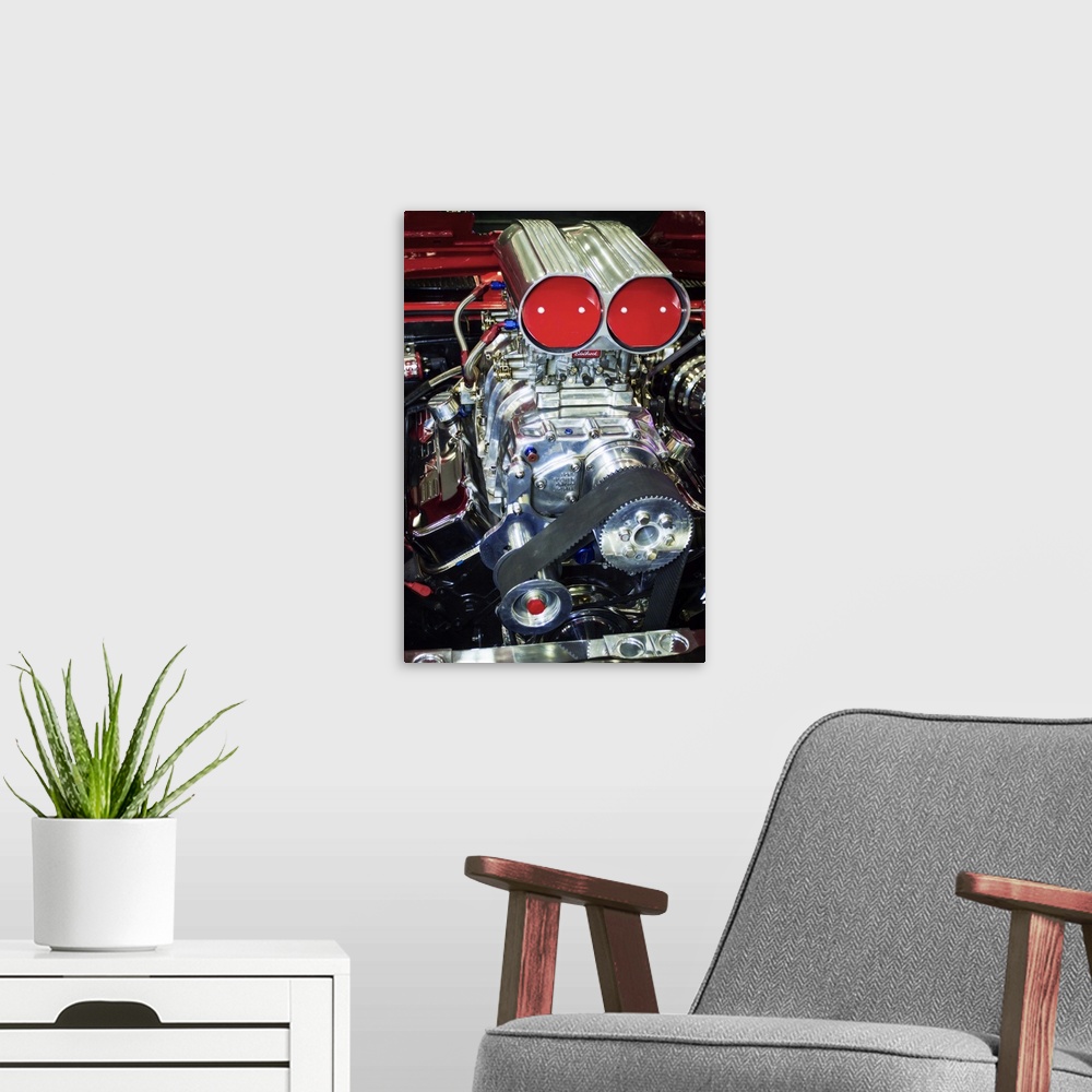 A modern room featuring Fine art photograph of the engine and pipes of a vintage hot rod car.
