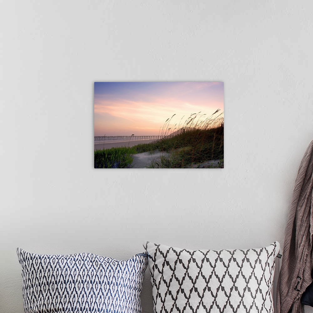 A bohemian room featuring Giant photograph taken from the side of a sandy dune scattered with high grass while it overlooks...