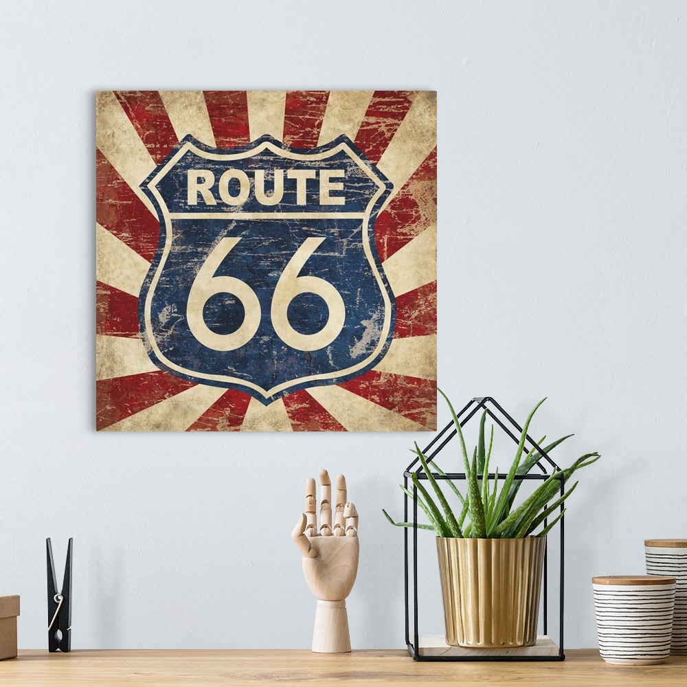 A bohemian room featuring Vintage blue Route 66 sign with a red and tan lined background.