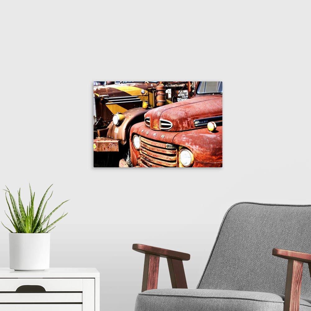 A modern room featuring Photograph of an old and rusty antique Ford truck.