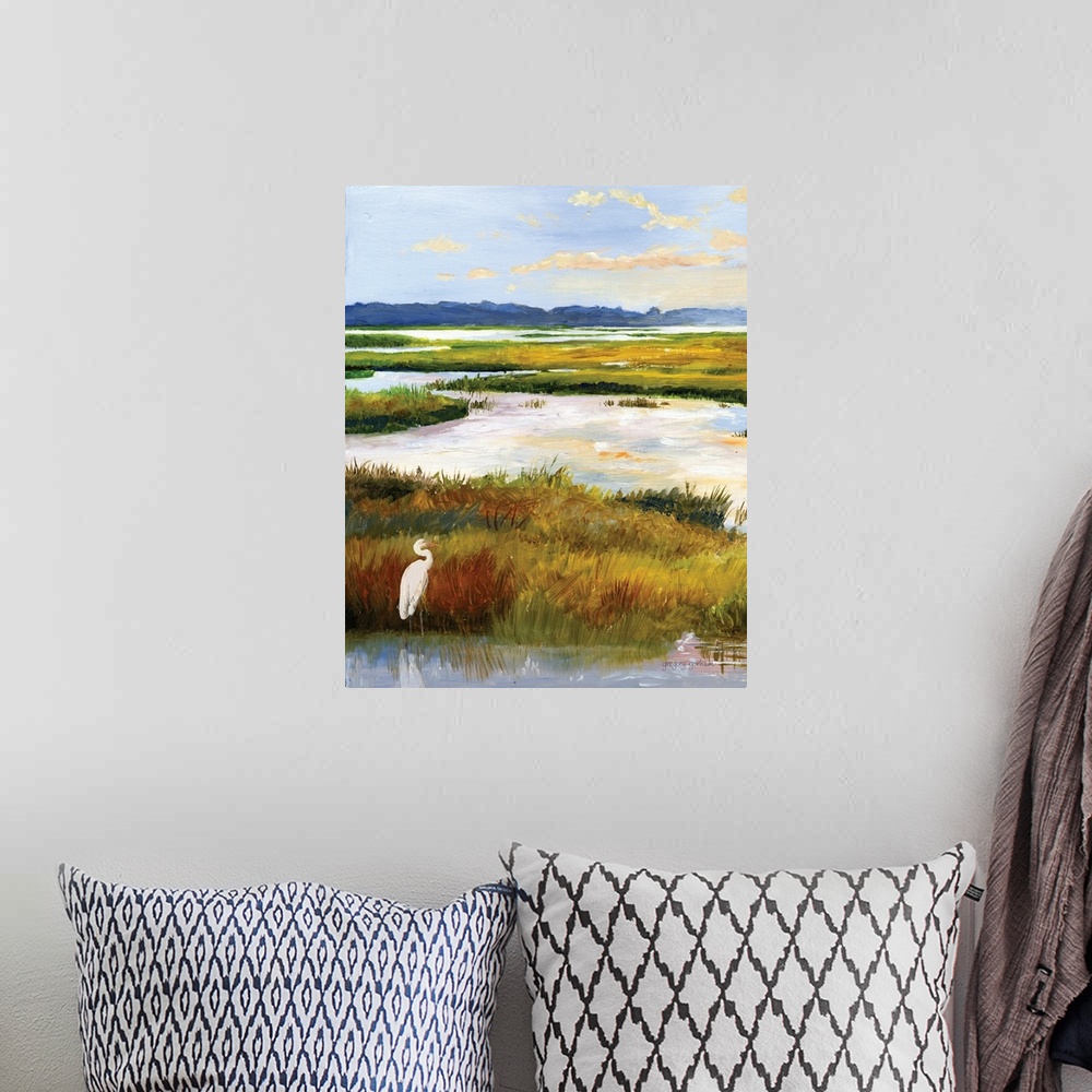 A bohemian room featuring A serene scene of water and grasses illuminated by the late afternoon sun. A white heron stands p...