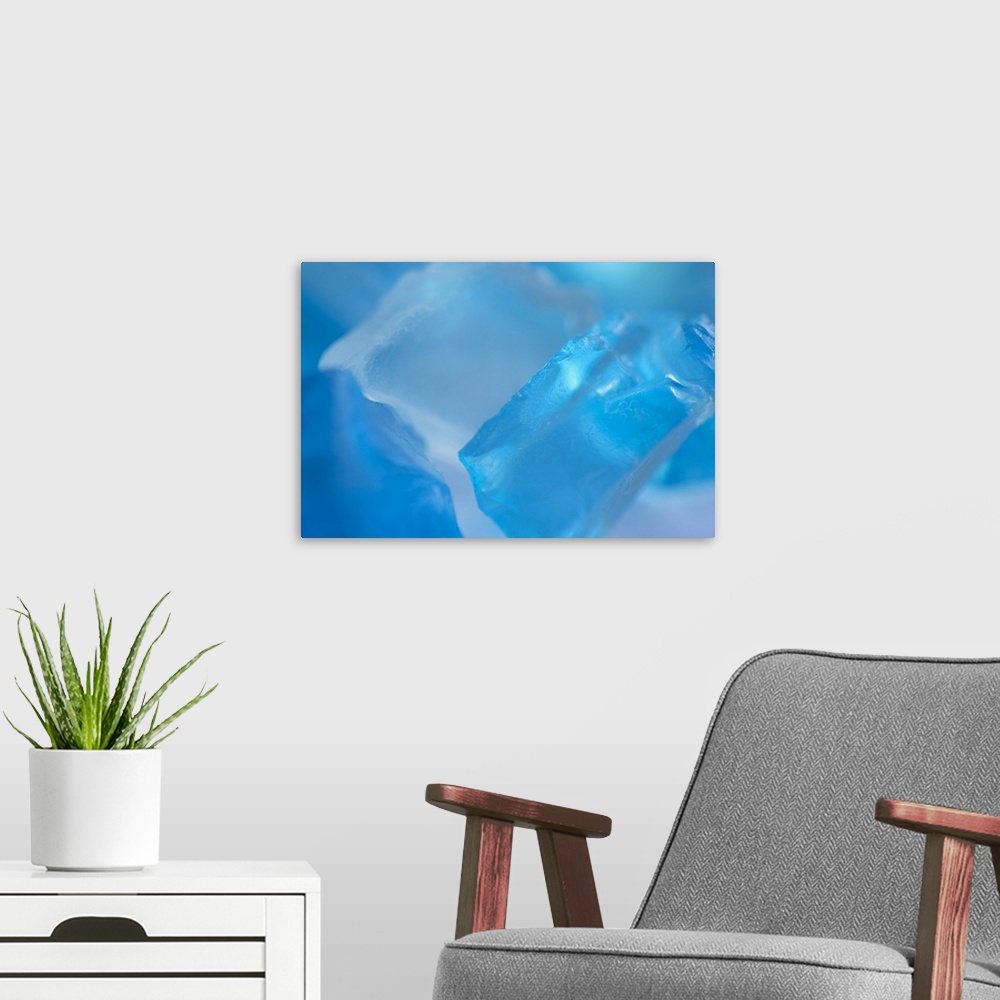A modern room featuring Close up of blue pieces of glass.