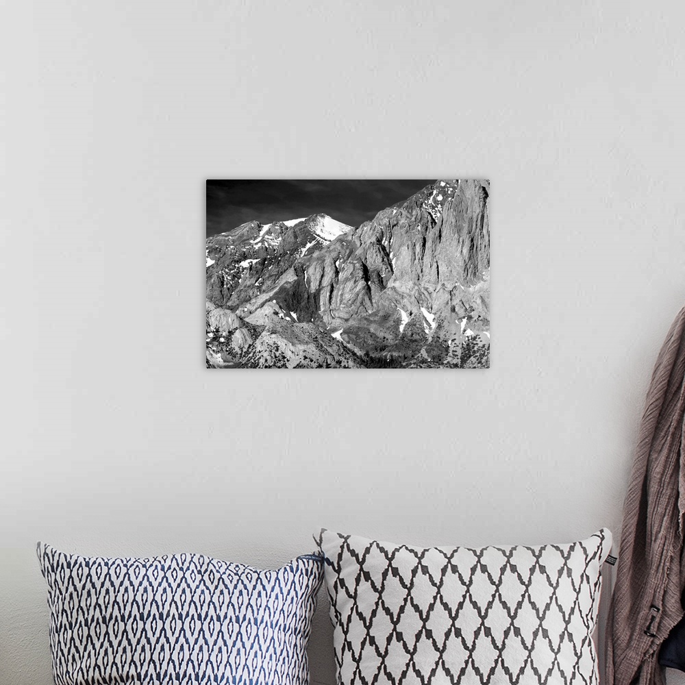A bohemian room featuring Black and white photograph of the Sevehah Cliffs in the Sierra Nevadas.