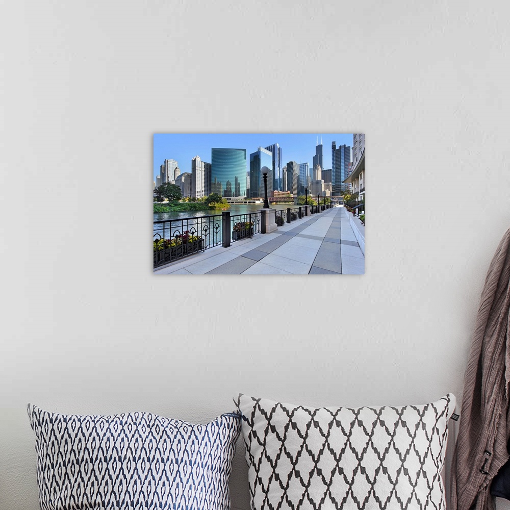A bohemian room featuring Large photograph of a sidewalk in Chicago, Illinois (IL) with downtown skyscrapers visible in the...