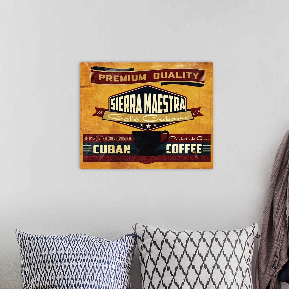 A bohemian room featuring Retro artwork advertising coffee from Cuba.
