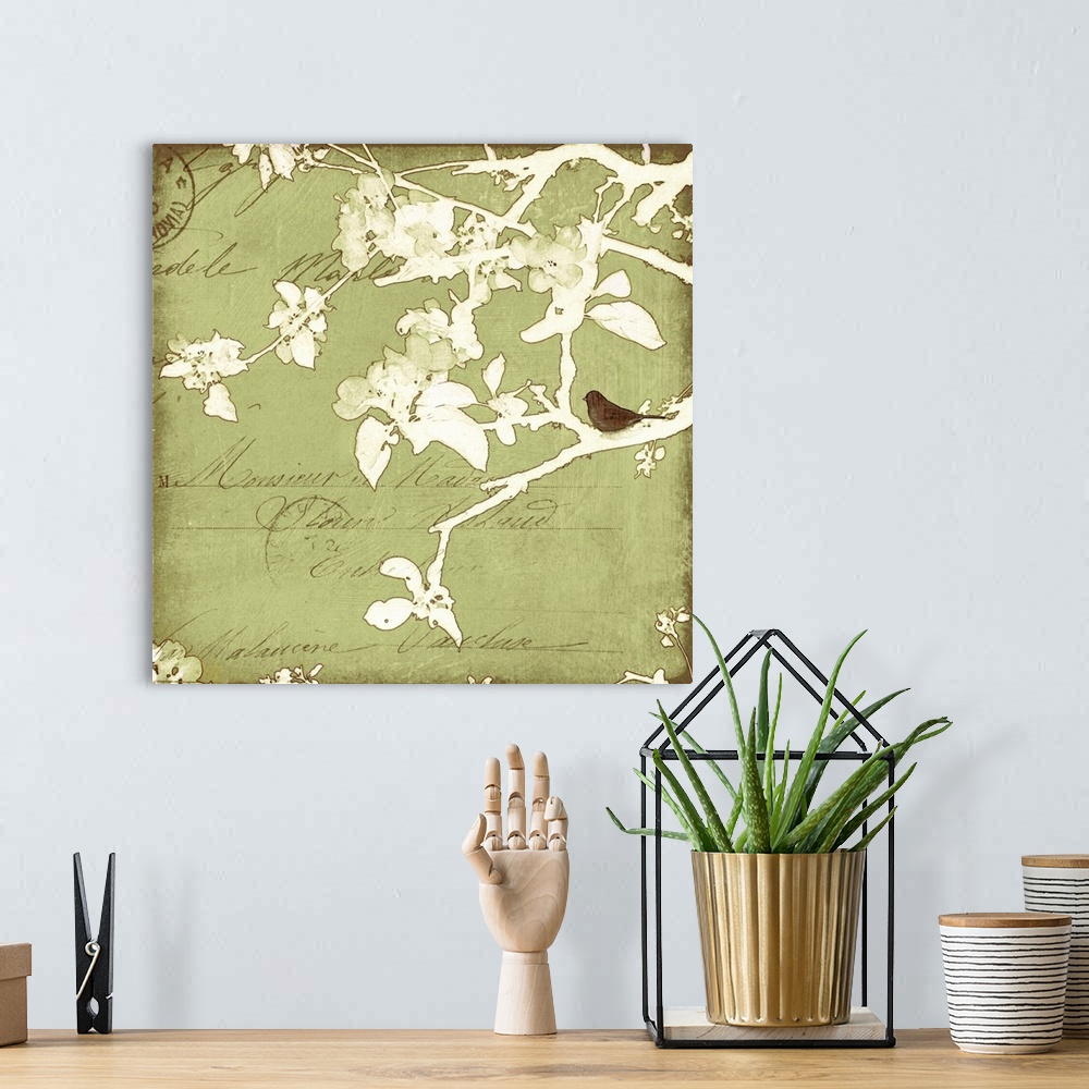 A bohemian room featuring Artwork featuring lettering and postmark overlain with a watercolor like branch and leaf silhouet...