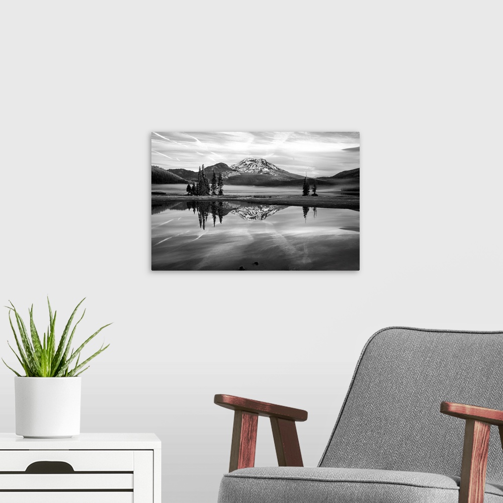 A modern room featuring Black and white landscape photograph of Sparks Lake in Oregon with South Sister Mountain in the b...