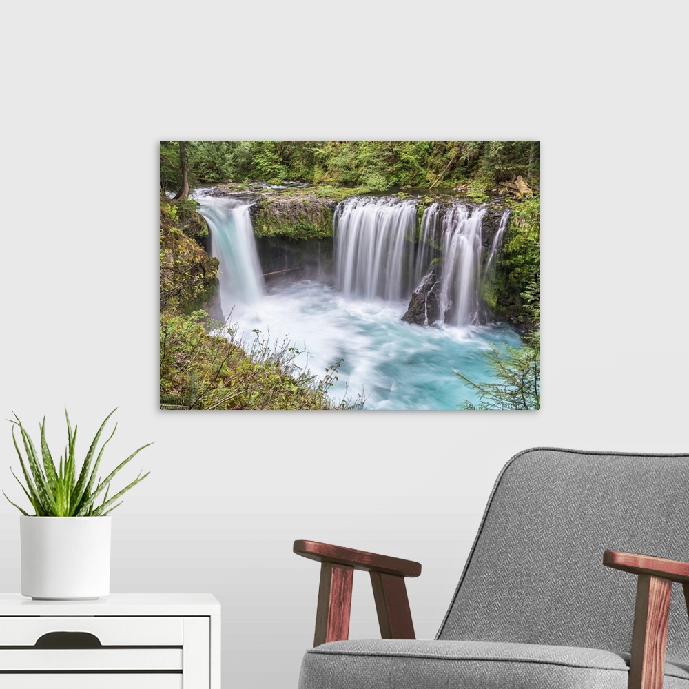 A modern room featuring Photograph of water rushing down Spirit Falls in Washington.