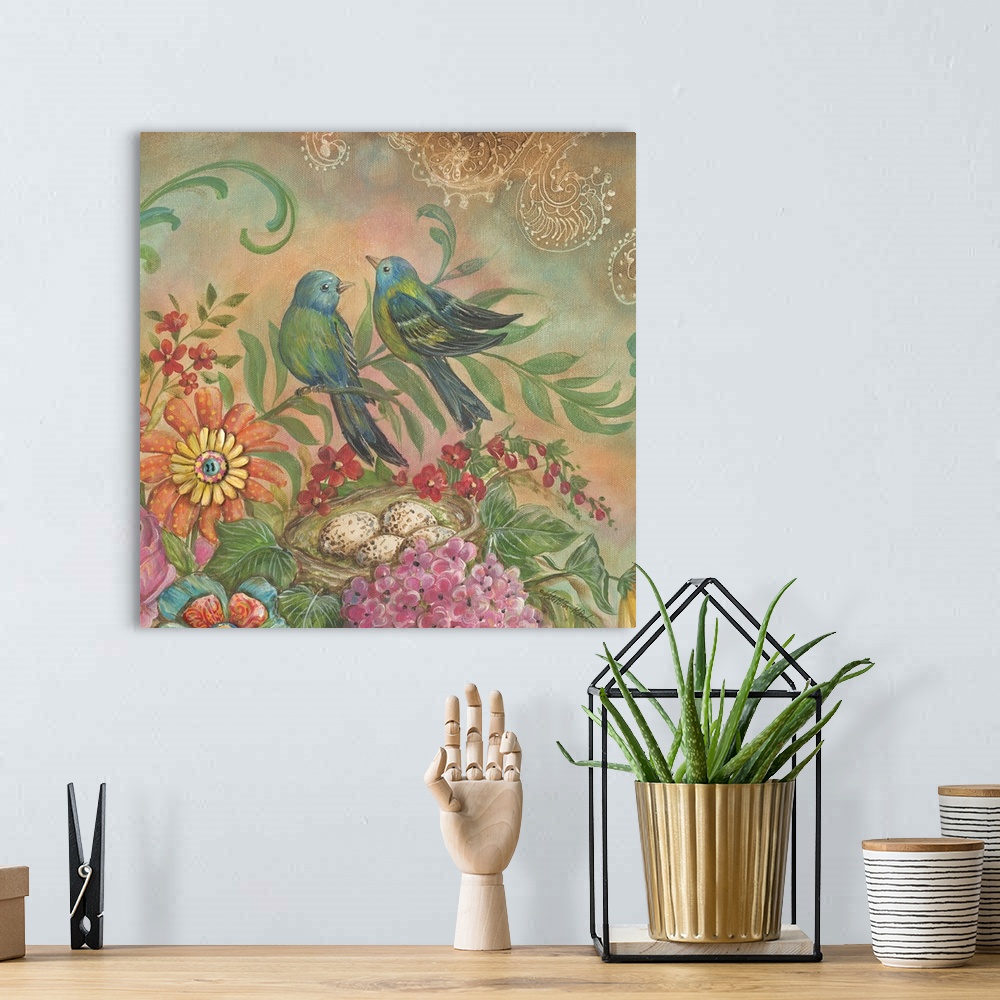 A bohemian room featuring Colorful square painting of two blue, green, and yellow birds with flowers.