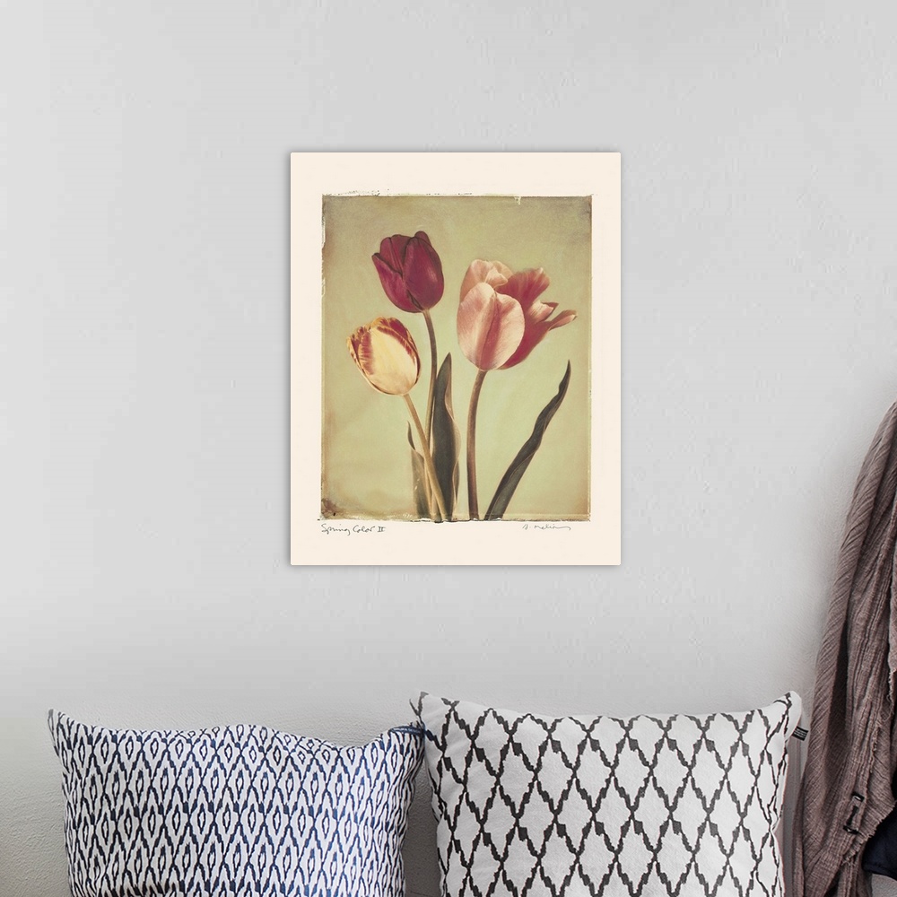 A bohemian room featuring Painting of three tulips.