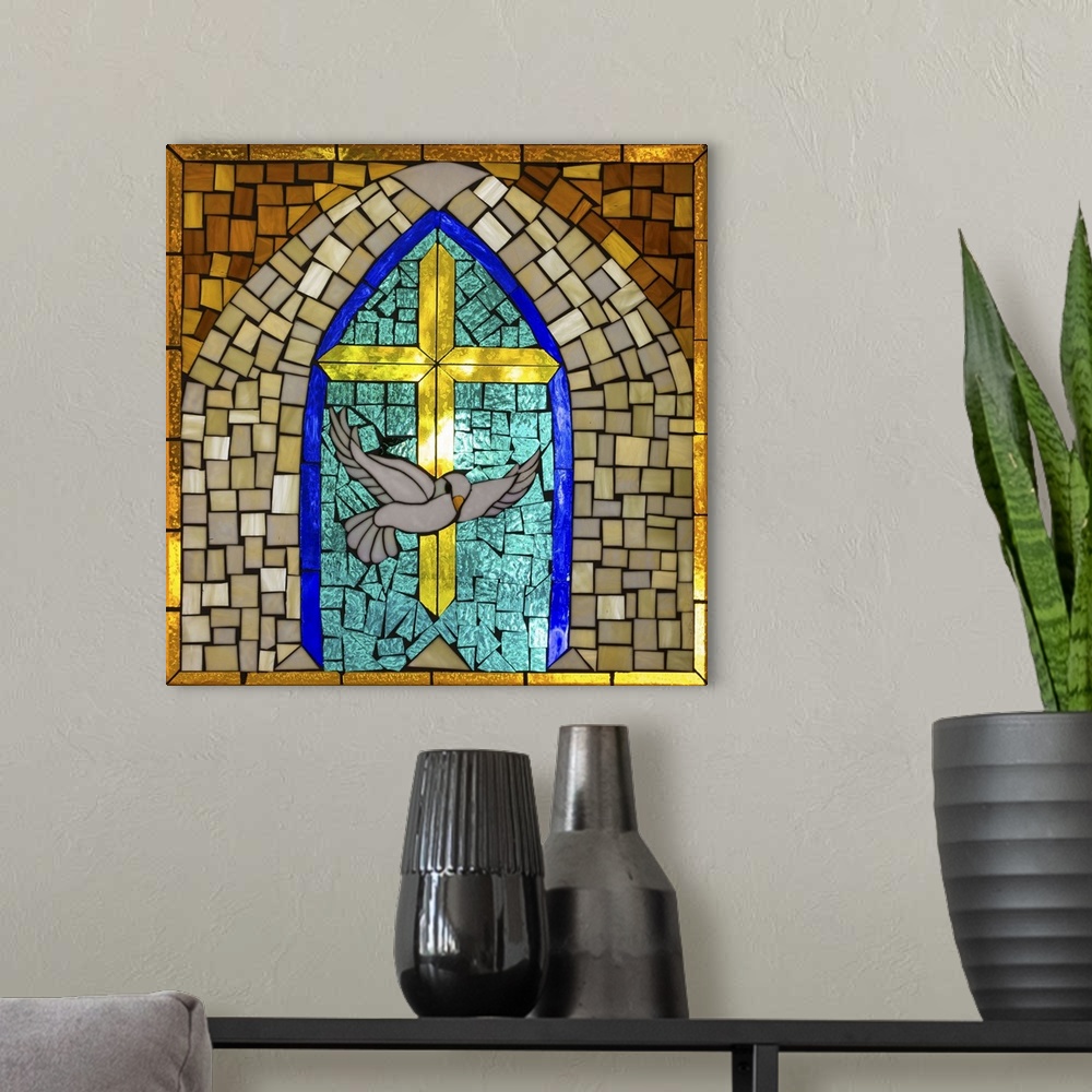 A modern room featuring Artwork done in a stained-glass style depicting a cross and dove, symbols of Christianity.