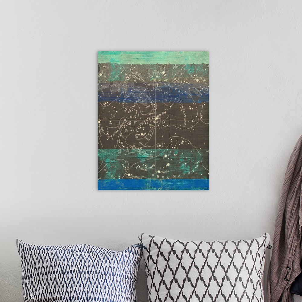 A bohemian room featuring Mixed media artwork with a star map and geometric painted shapes.