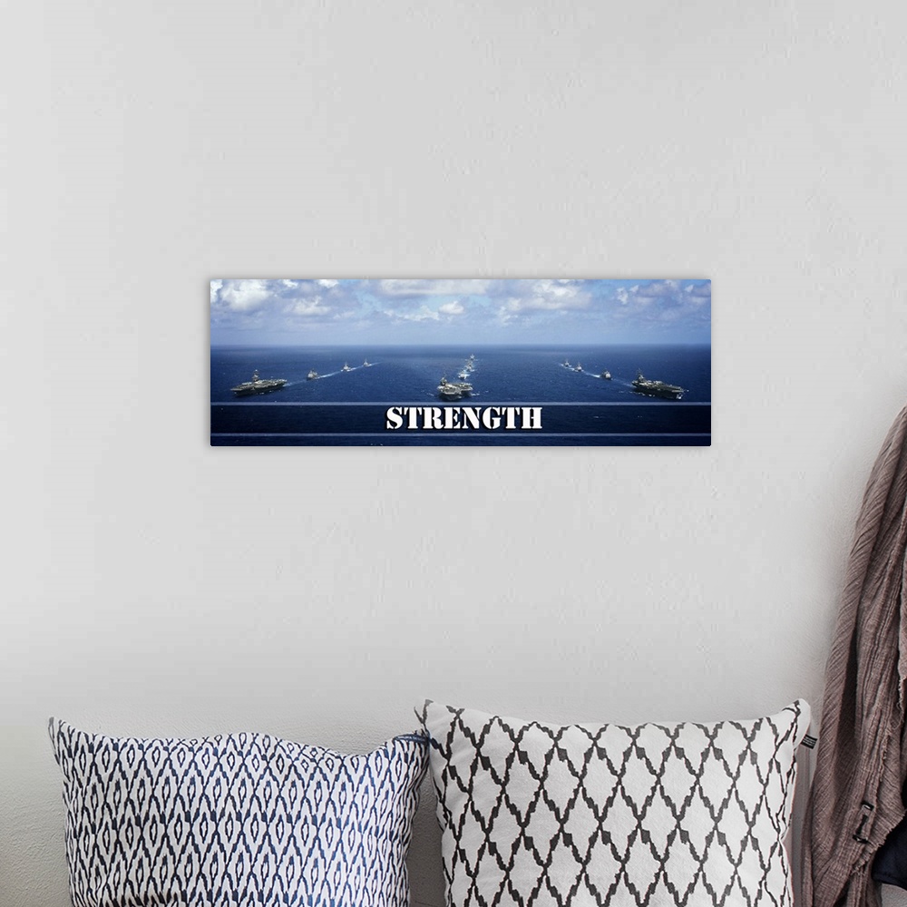 A bohemian room featuring Inspirational panoramic photograph of three lines of Navy ships in the middle of the ocean with "...