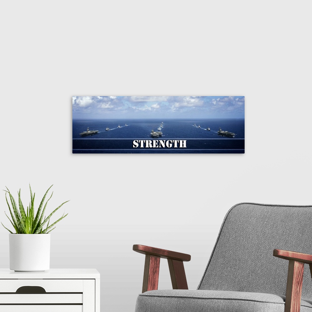 A modern room featuring Inspirational panoramic photograph of three lines of Navy ships in the middle of the ocean with "...