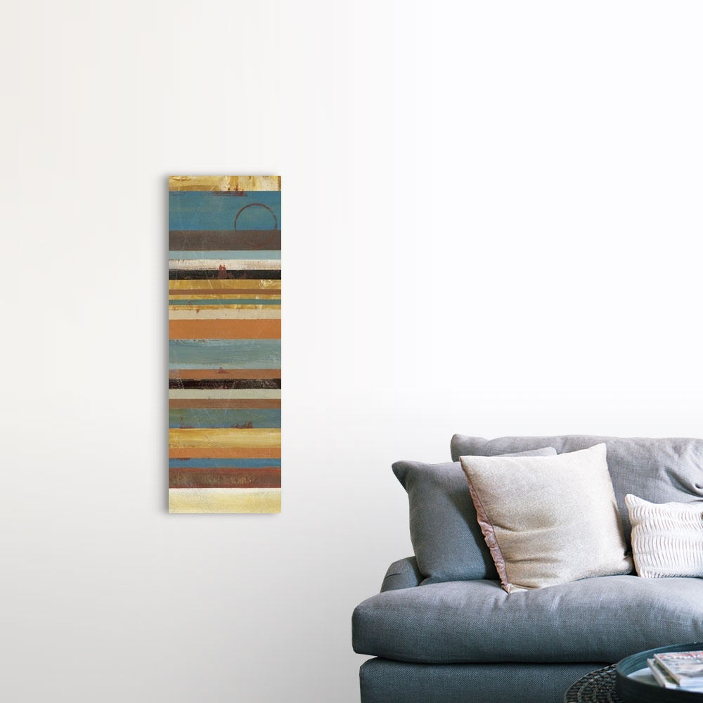 A farmhouse room featuring A thin vertical piece with stripes of muted colors running horizontally across the print.