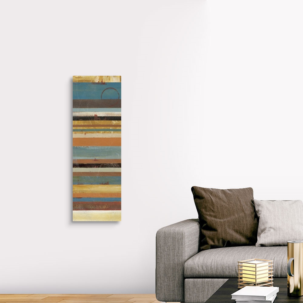 A traditional room featuring A thin vertical piece with stripes of muted colors running horizontally across the print.