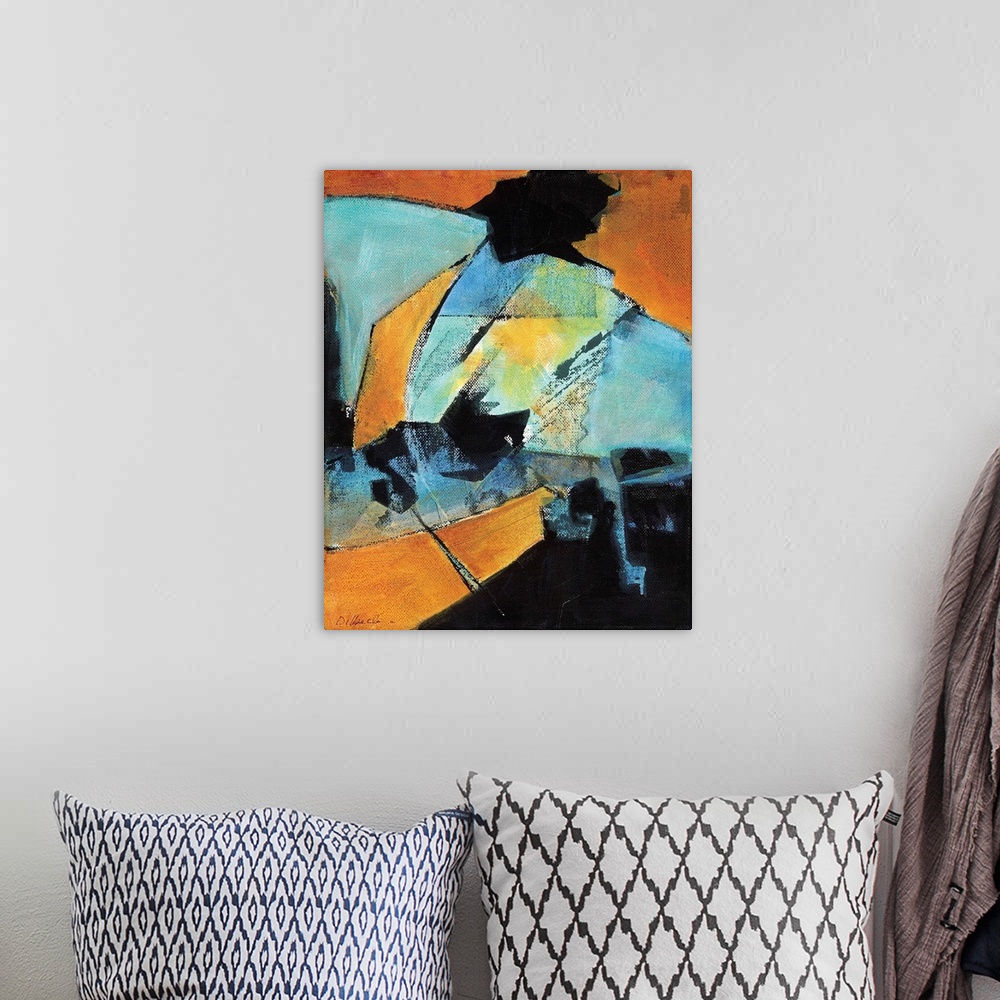 A bohemian room featuring Abstract painting of complied random shapes in shades of blue, orange, and black