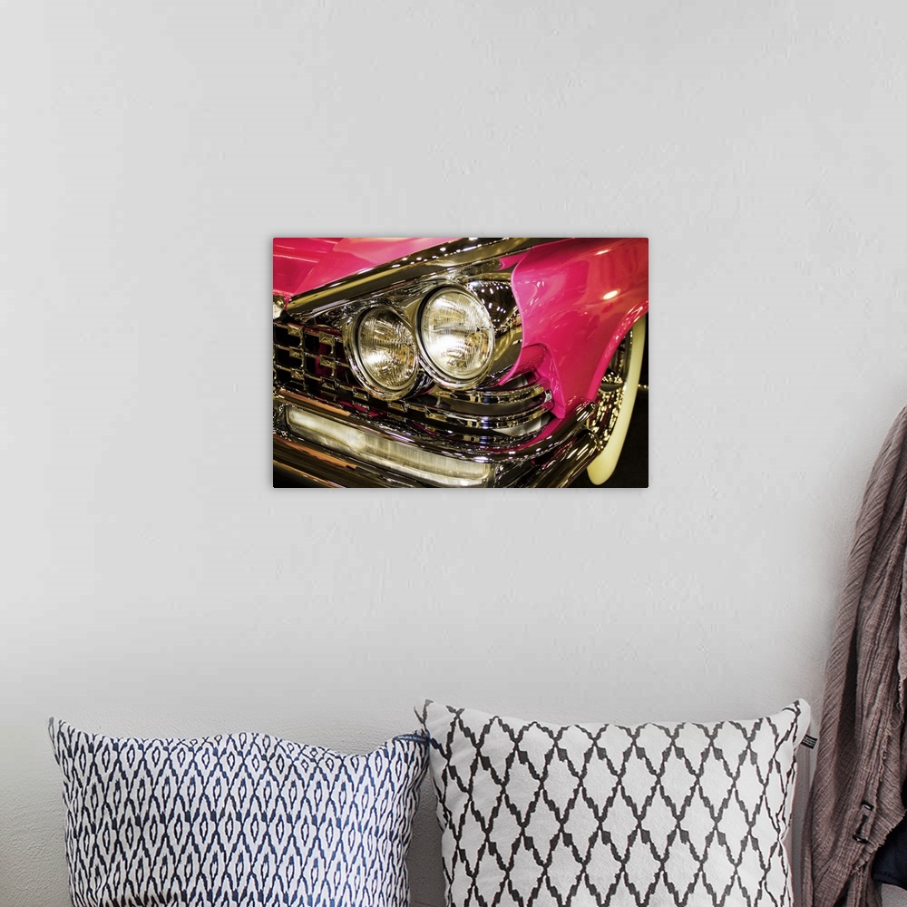 A bohemian room featuring Fine art photograph of the headlights of a hot pink vintage car.