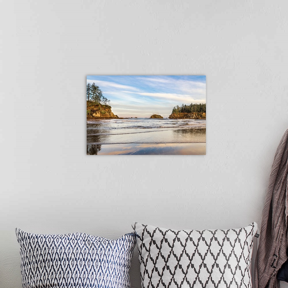 A bohemian room featuring Landscape photograph of the end of a sunrise over the water at Sunset Bay State Park, Oregon.