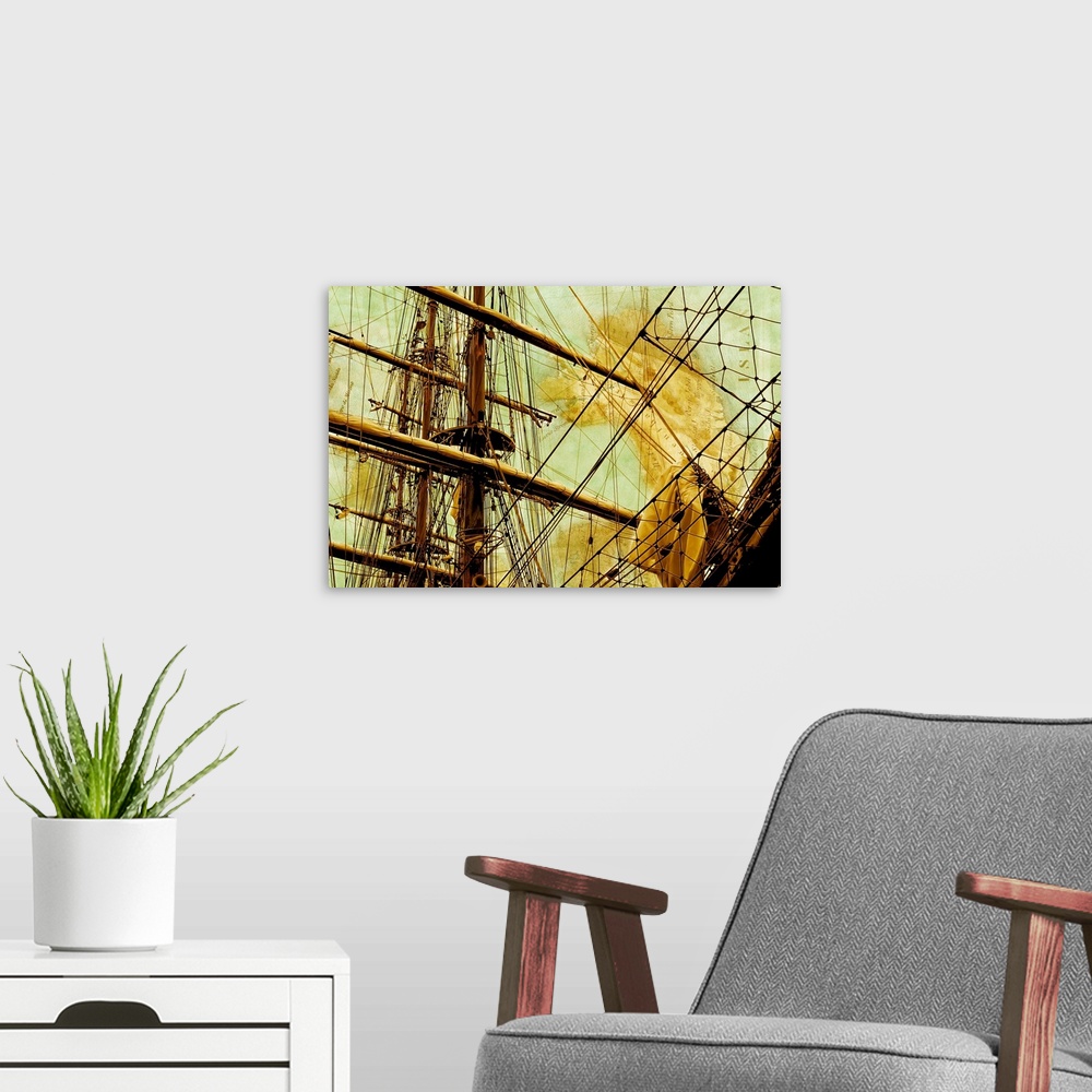 A modern room featuring Close-up photograph of a sailboat mast with golden tones and a faded map in the background.