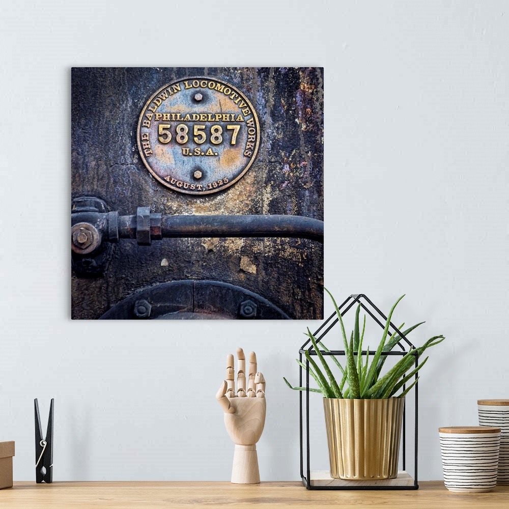 A bohemian room featuring Photograph of weathered detail from a vintage train locomotive.
