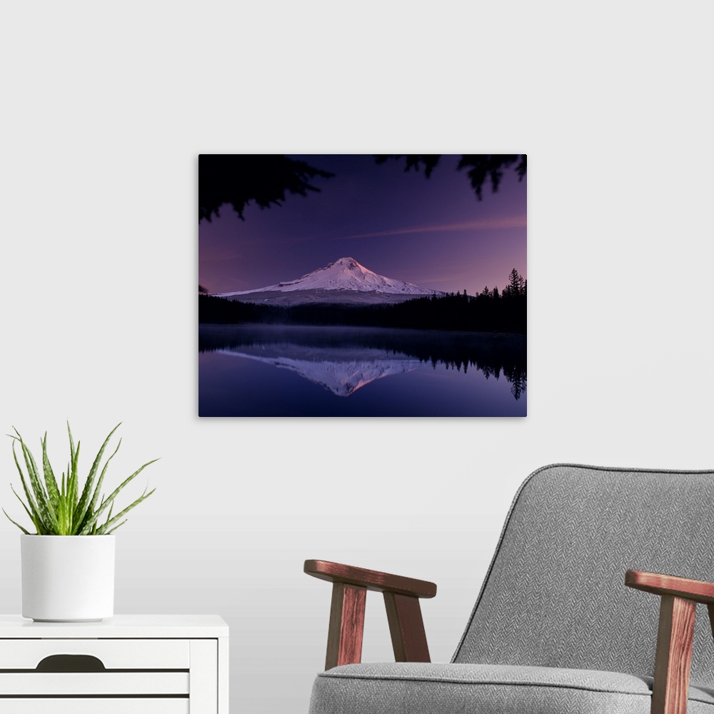 A modern room featuring Landscape photograph of Mount Hood reflecting onto Trillium Lake during a purple and pink sunset.
