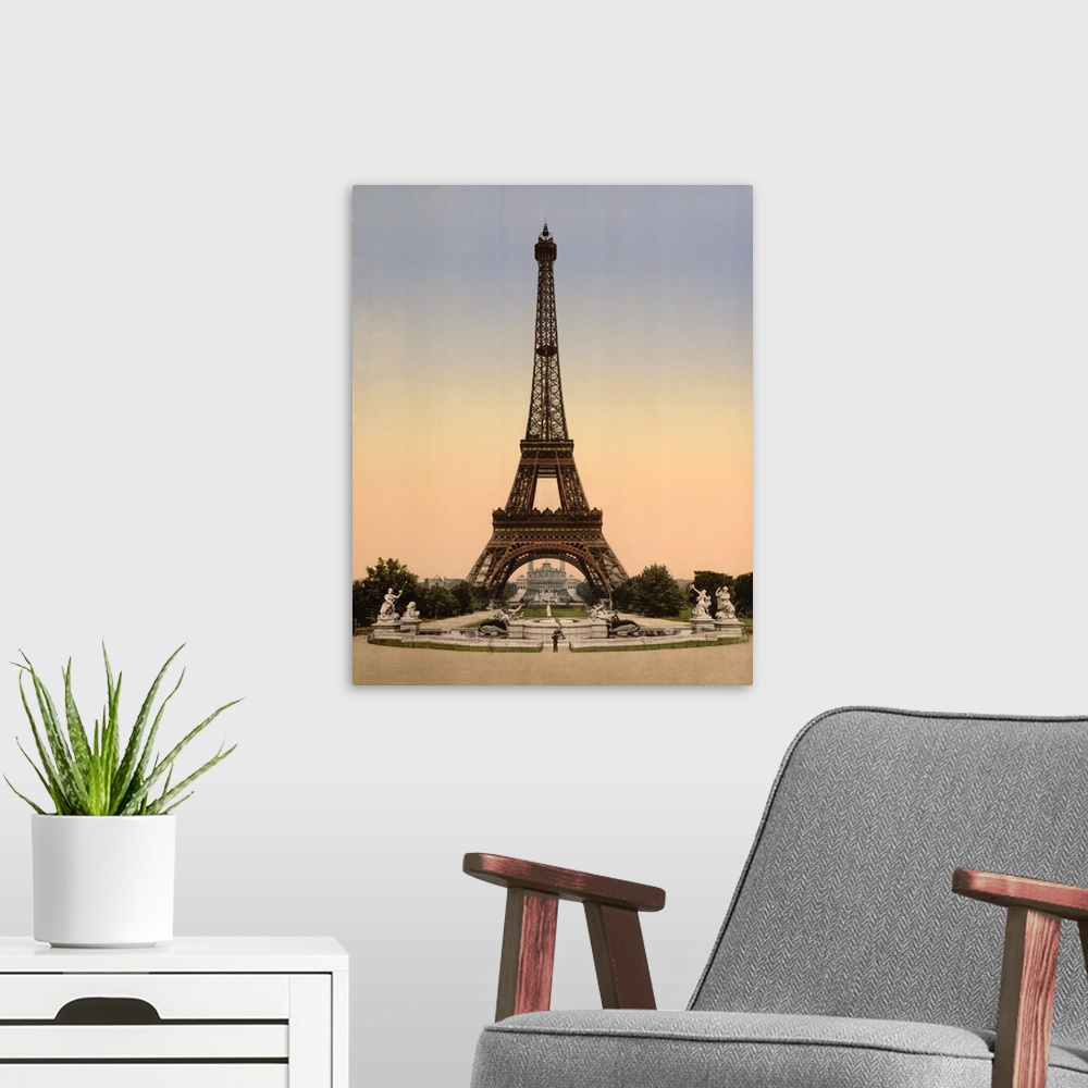 A modern room featuring Vintage photograph of the Eiffel Tower in Paris at sunset.