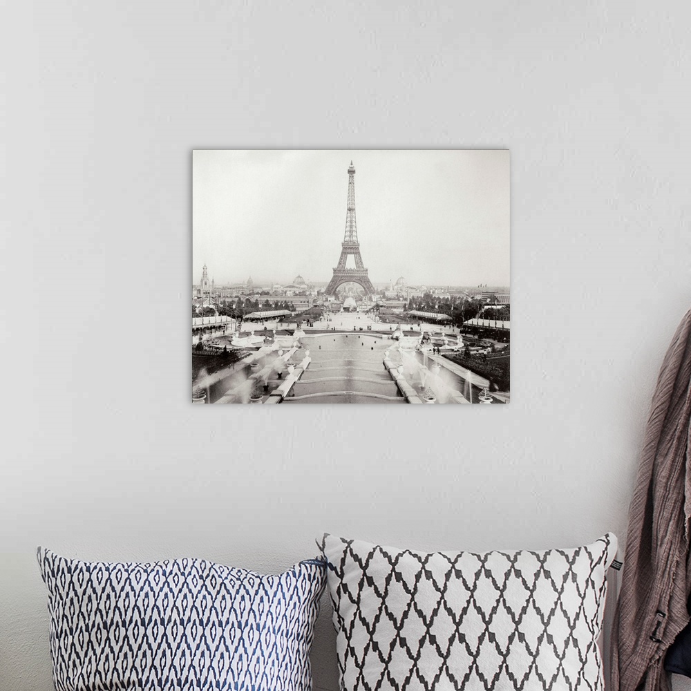 A bohemian room featuring A vintage photograph of the Eiffel Tower in Paris.