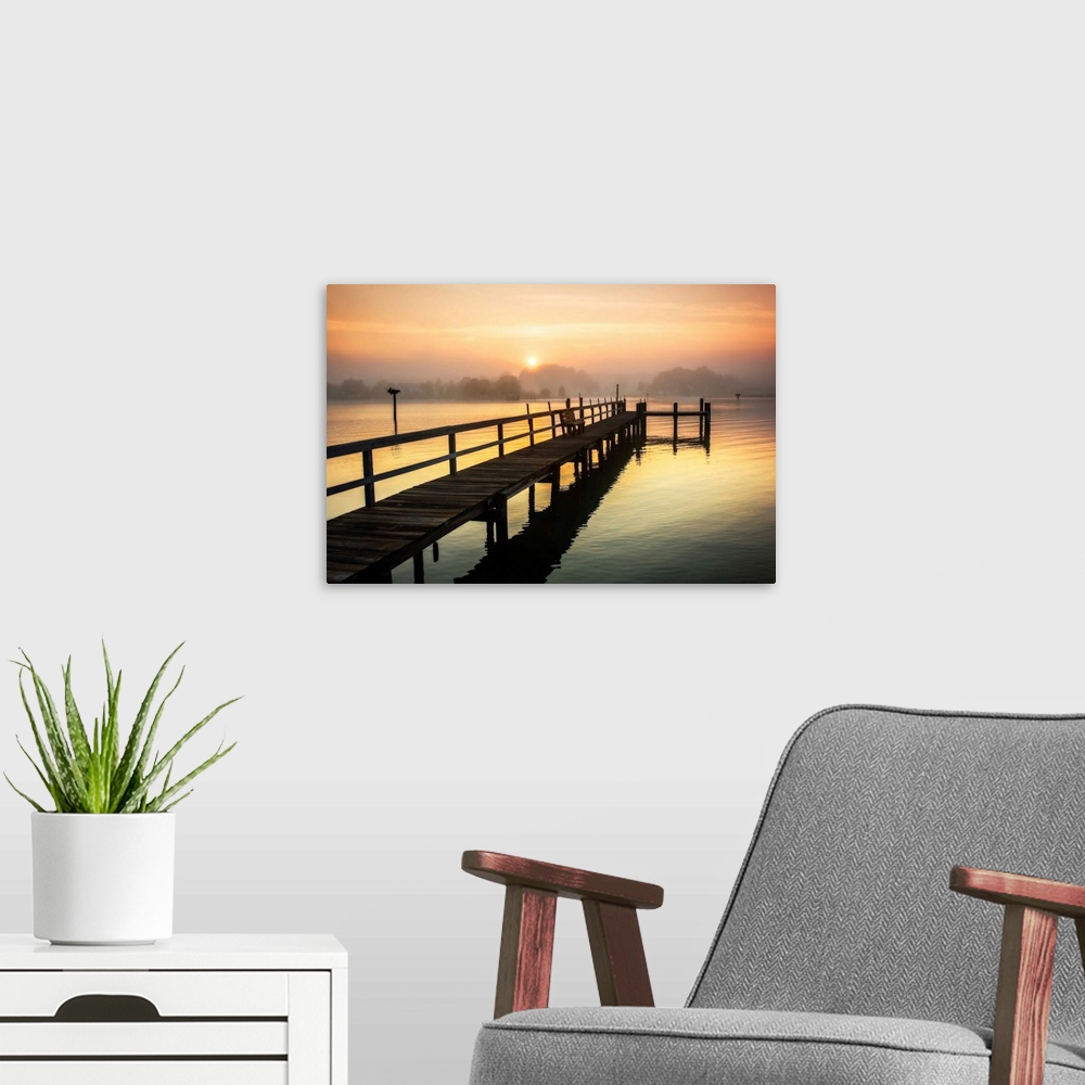 A modern room featuring Photograph of a dock on the Wicomico River with a hazy sunrise above, Maryland.