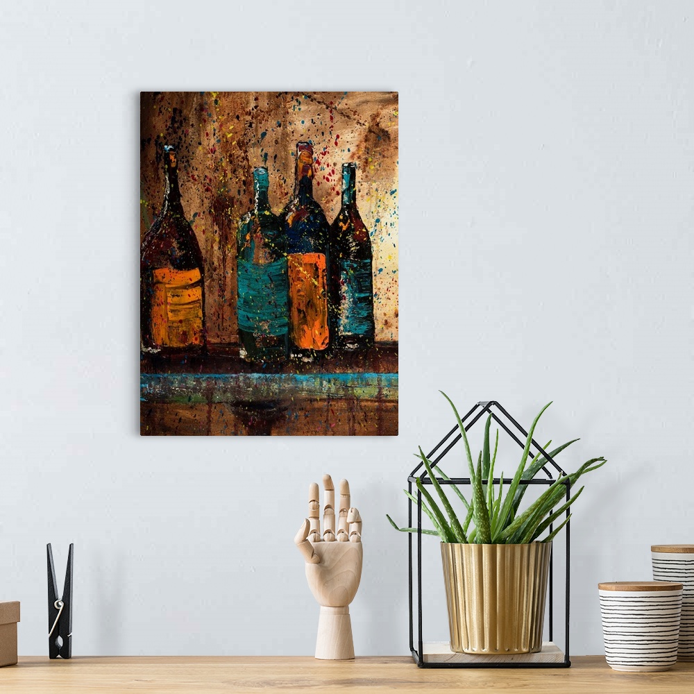 A bohemian room featuring Painting of wine bottles with blue and orange labels on a shelf with a neutral colored background...