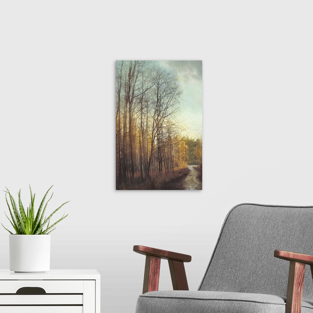 A modern room featuring Contemporary painting of a forest in the late fall in afternoon light, consisting of trees with b...