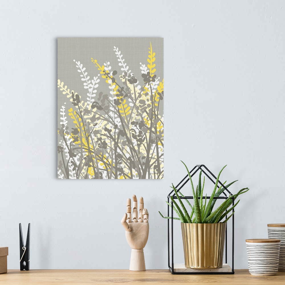 A bohemian room featuring Graphic illustration of white, gray, and yellow silhouetted plants and flowers leaning towards th...