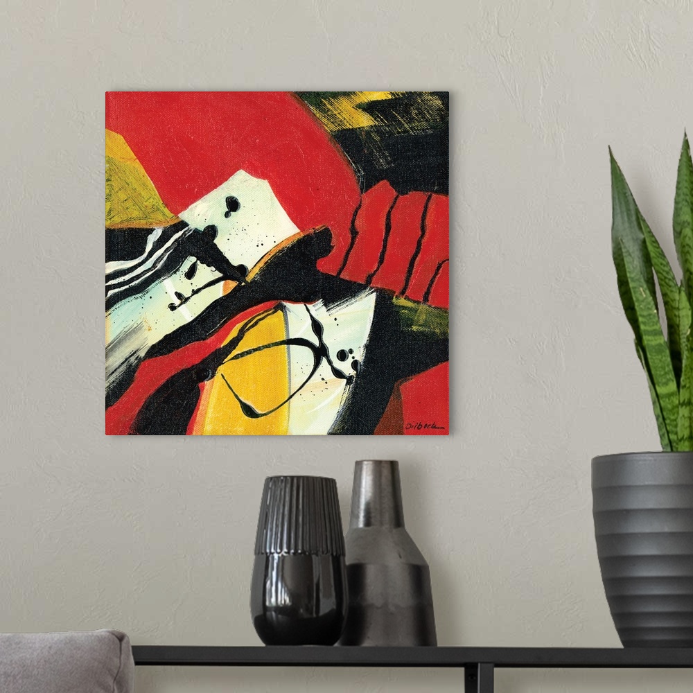 A modern room featuring Square abstract painting with bold red, yellow, black, and white hues.