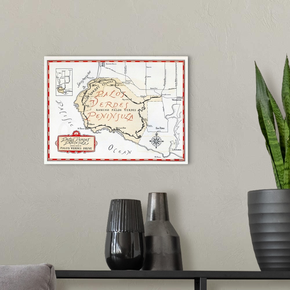A modern room featuring 1935 promotional map for the Palos Verdes Peninsula and the city of Palos Verdes Estates, incorpo...