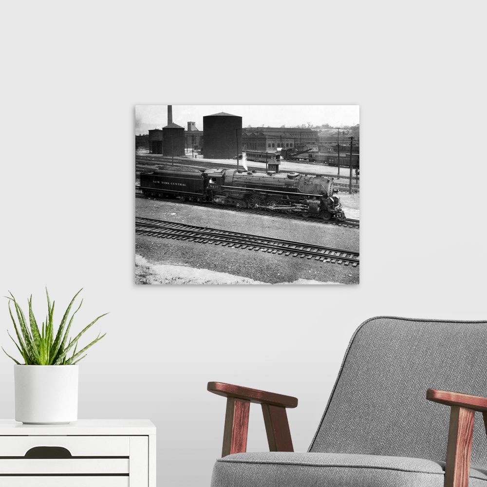 A modern room featuring New York, NY: New Series of train engine Known as 5200 Series, used on fast passenger trains.