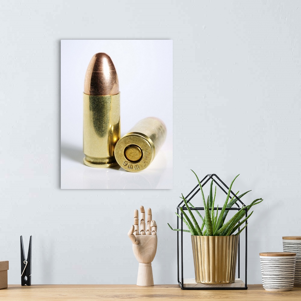 A bohemian room featuring 9mm bullets against white backdrop.