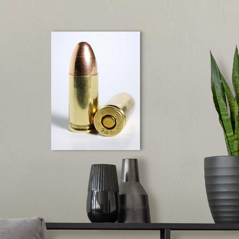 A modern room featuring 9mm bullets against white backdrop.