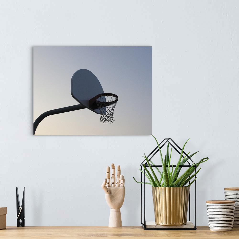 A bohemian room featuring A basketball backboard hoop and net. Clear blue sky