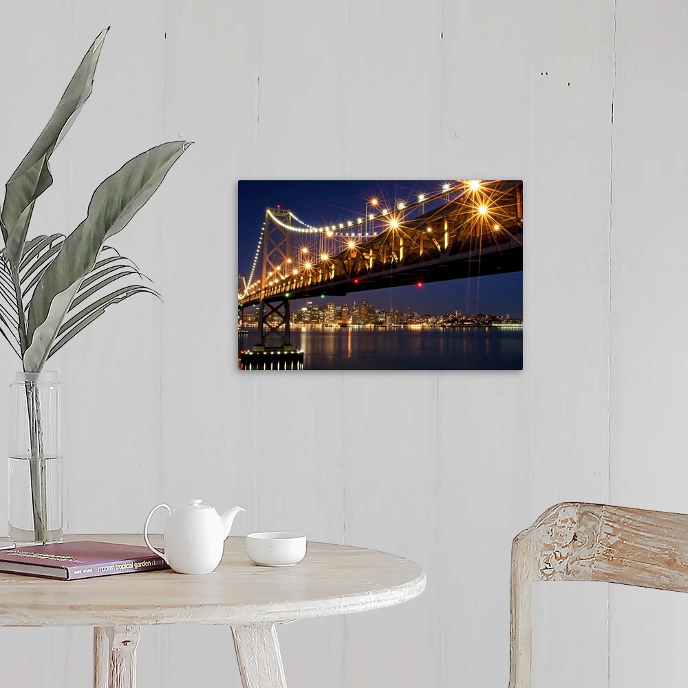 A farmhouse room featuring A burst of lights on the Bay Bridge and San Francisco skyline in the background.