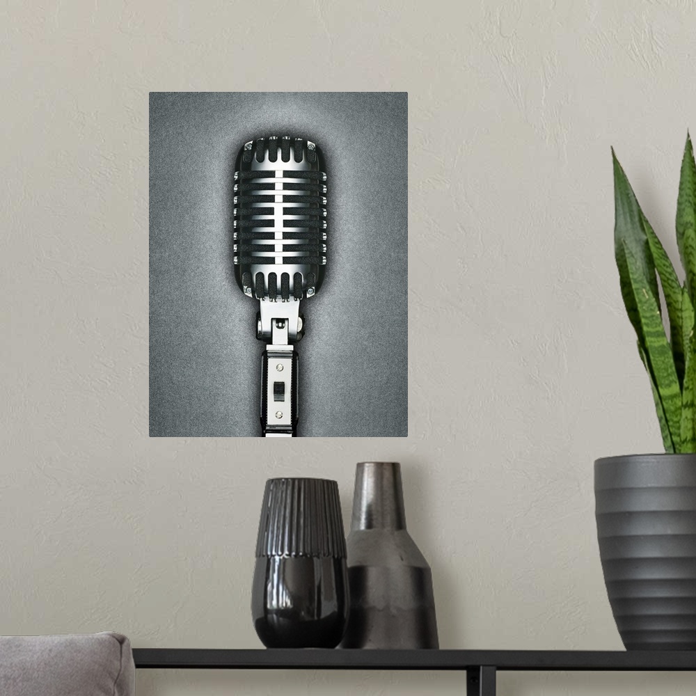 A modern room featuring Wall art for the home or office this photograph shows this piece of musical equipment against a s...