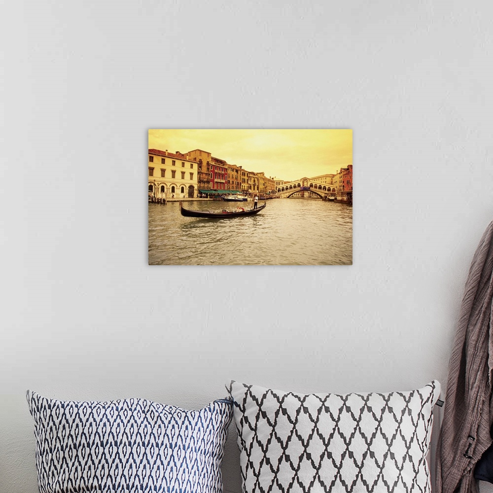 A bohemian room featuring Gondola in a canal, Rialto Bridge, Venice, Italy