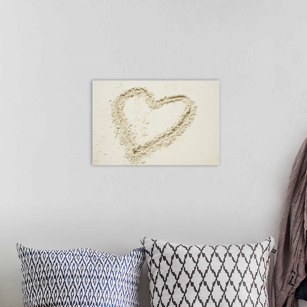 A bohemian room featuring A heart shape in the sand
