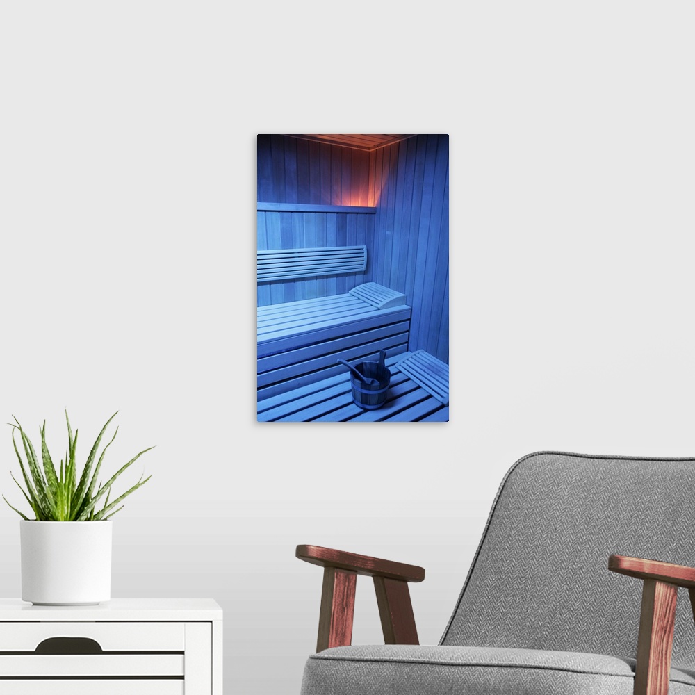 A modern room featuring A sauna in blue light, Sweden.