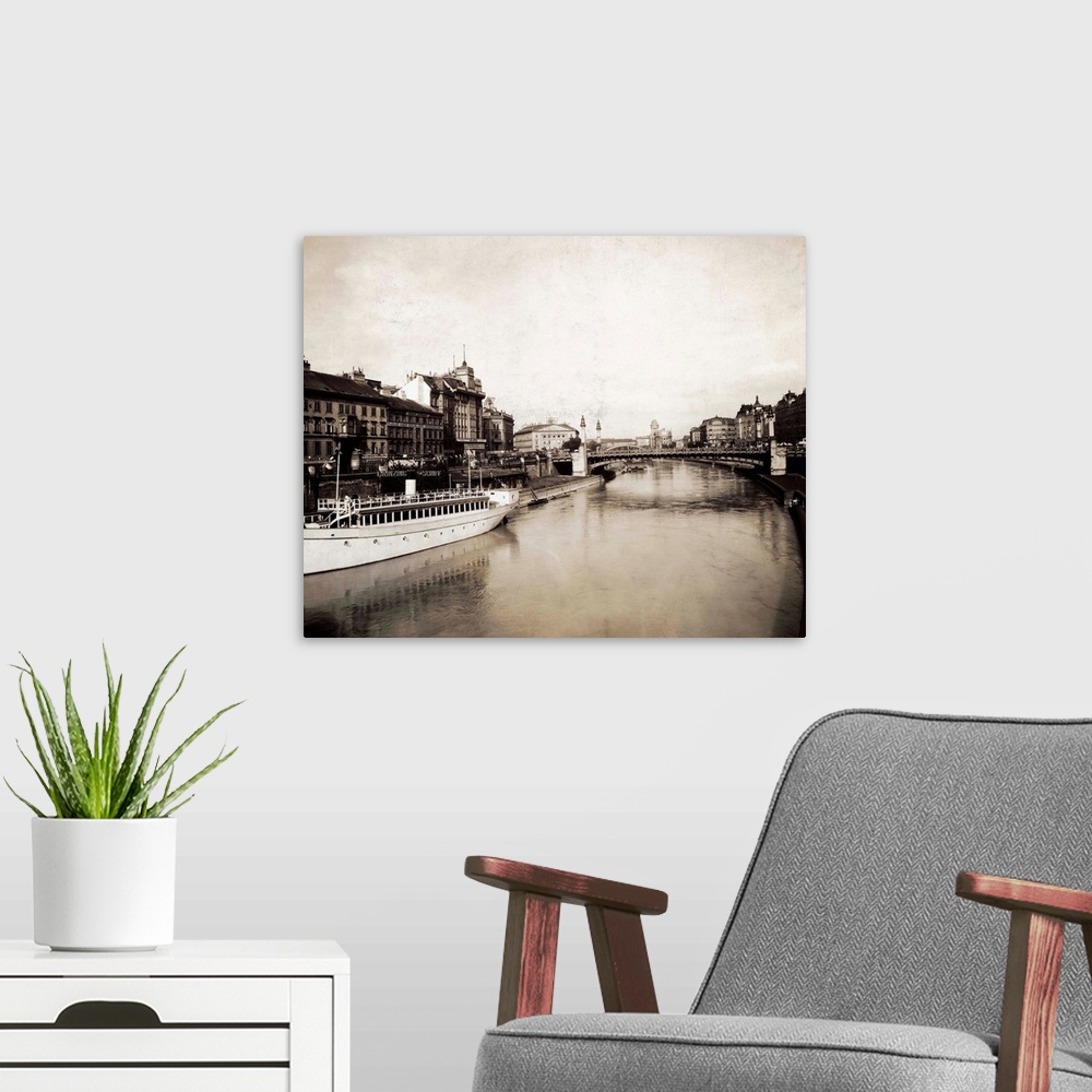A modern room featuring Photo shows the Schwedenbrucke over the Danube River. The bridge is made famous by the popular co...